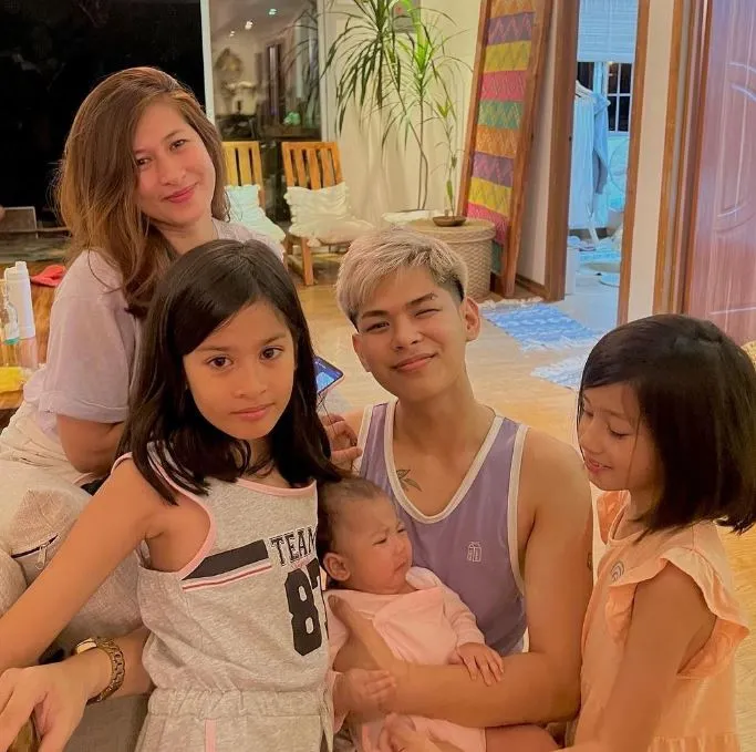 Andrei with his mother and sisters