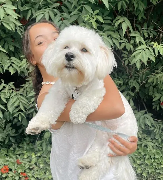Ivory with her pet dog